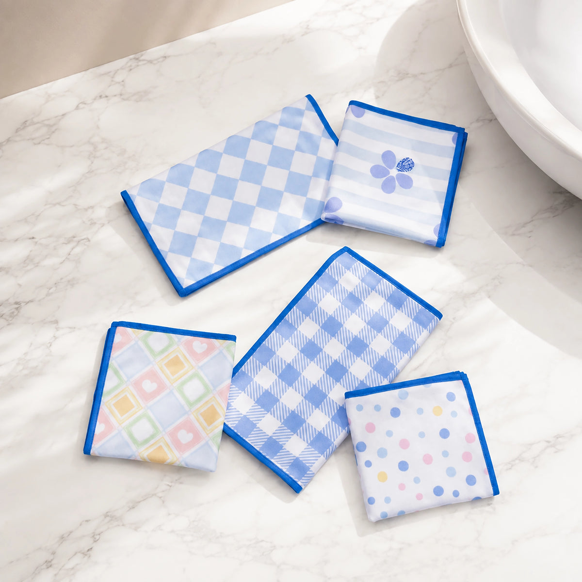 Small towels displayed on a bathroom counter