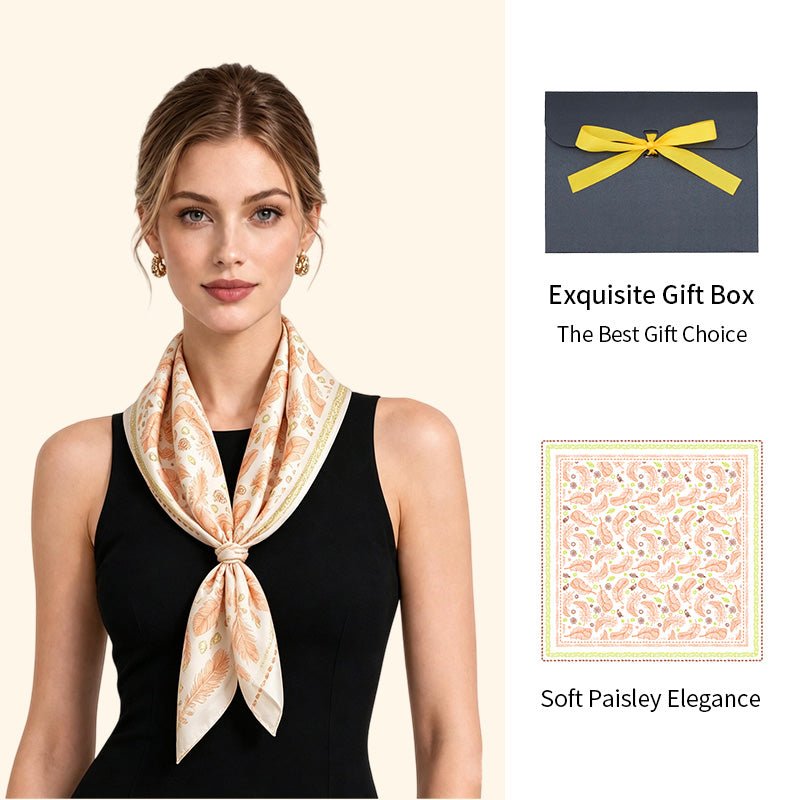 Model wearing a soft peach paisley square scarf