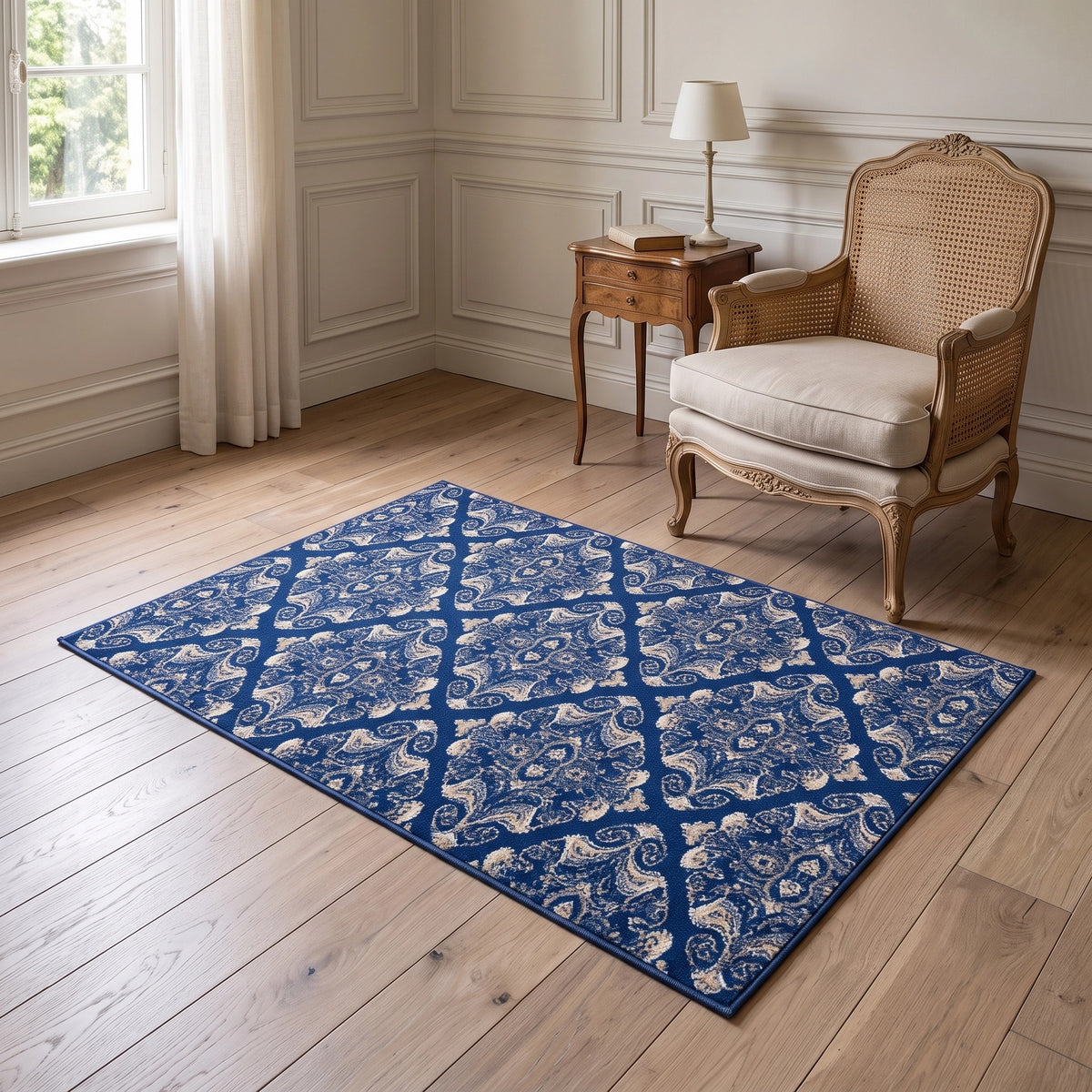 Blue patterned area rug in a light sitting room
