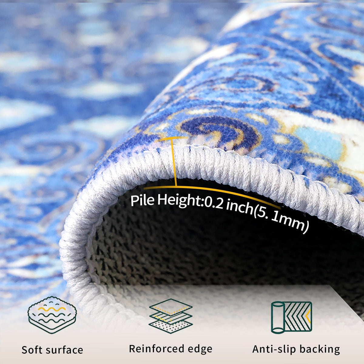 Close-up of a rolled blue patterned rug showing pile height and underside, with text reading 'Pile Height: 0.2 inch (5.