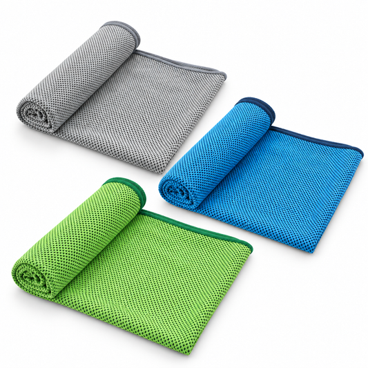 Rolled gray, blue and green solid cooling towels